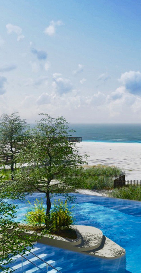 pool overlooking beach and ocean